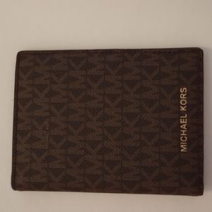 Nwot. Michael kors passport cover.